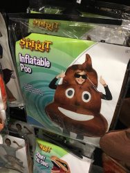 A photo of a costume in a box on a wall at Spirit Halloween, showing an "Inflatable Poo" costume.