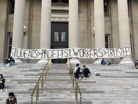 Banner across Low columns reading "STUDENTS > PROFITS! WORKERS > TRUSTEES!" 